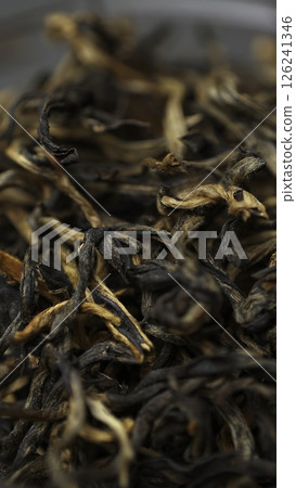 Aesthetic and aromatic dried tea leaves carefully arranged in a bowl for you to enjoy. Media Aesthetic and aromatic dried tea leaves carefully arranged in a bowl for you to enjoy. Media 126241346