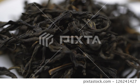 Dried Tea Leaves Perfect for Brewing and Infusion for a Quality Beverage Experience. Media Dried Tea Leaves Perfect for Brewing and Infusion for a Quality Beverage Experience. Media 126241427