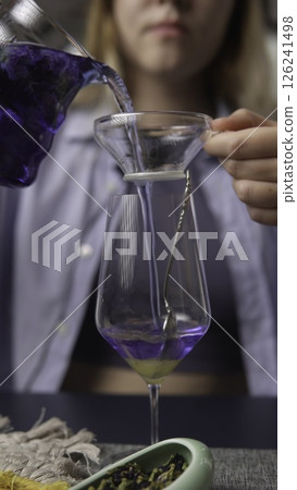 Brewing Herbal Tea with a Strainer and Fresh Ingredients for a Delightful Experience. Media Brewing Herbal Tea with a Strainer and Fresh Ingredients for a Delightful Experience. Media 126241498