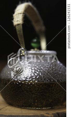 This is an Authentic Glass Teapot featuring Natural Details that enhance its beauty. Media This is an Authentic Glass Teapot featuring Natural Details that enhance its beauty. Media 126241531