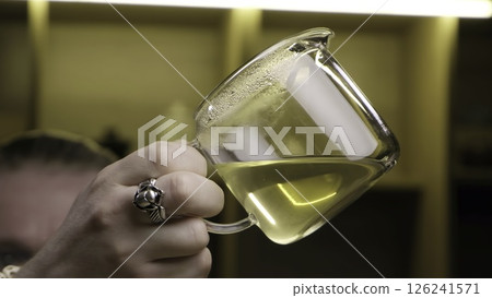 Pouring a Liquid in a Laboratory Setting Requires Precise Measurement and Safety Precautions. Media 126241571