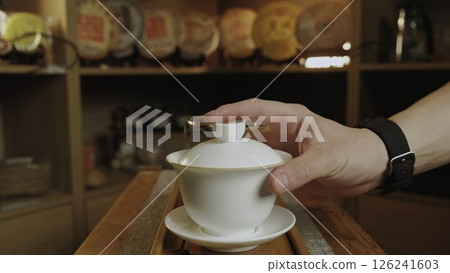 A serene video shows beverage preparation on a rustic table. Media 126241603