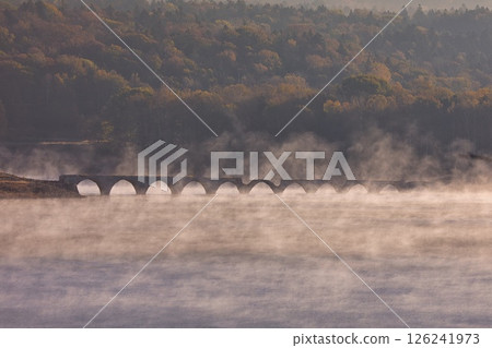 Taushubetsu River Bridge in Autumn Taushubetsu River Bridge in Autumn 126241973