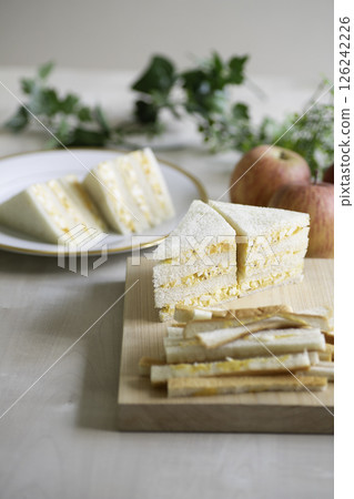 Freshly made egg sandwiches in a bright kitchen Freshly made egg sandwiches in a bright kitchen 126242226