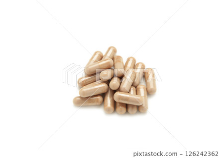 Beige pills isolated on white background. Top view 126242362