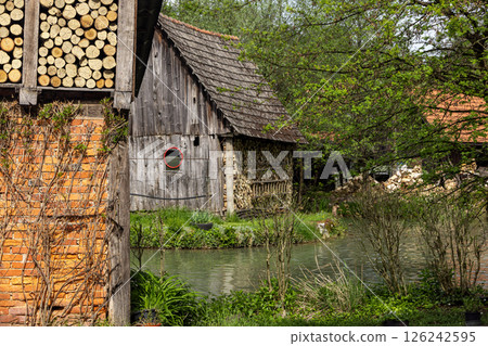 The historic village of Rastoke in the town of Slunj, where the Slunjcica River flows into the Korana River via cascades and waterfalls, Croatia 126242595