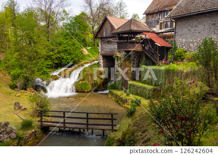 The historic village of Rastoke in the town of Slunj, where the Slunjcica River flows into the Korana River via cascades and waterfalls, Croatia 126242604