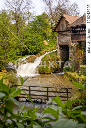 The historic village of Rastoke in the town of Slunj, where the Slunjcica River flows into the Korana River via cascades and waterfalls, Croatia 126242605