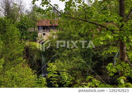 The historic village of Rastoke in the town of Slunj, where the Slunjcica River flows into the Korana River via cascades and waterfalls, Croatia 126242623