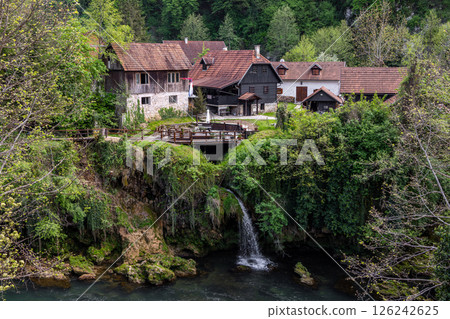 The historic village of Rastoke in the town of Slunj, where the Slunjcica River flows into the Korana River via cascades and waterfalls, Croatia The historic village of Rastoke in the town of Slunj, where the Slunjcica River flows into the Korana River via cascades and waterfalls, Croatia 126242625