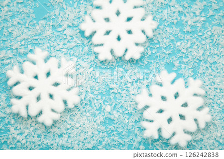 Beautiful snowflakes with snow on blue background. Beautiful snowflakes with snow on blue background. 126242838