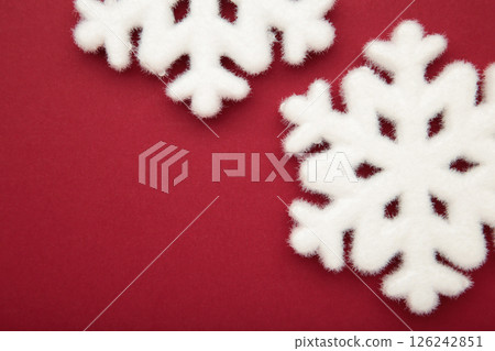 Beautiful snowflakes on red background. Space for text Beautiful snowflakes on red background. Space for text 126242851