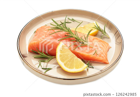 Red fish. Raw salmon fillet with rosemary and lemon on plate isolated on white background. 126242985