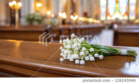 Lily-of-the-valley bouquet on a church altar symbolizing chrismation 126243046