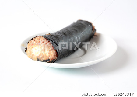Korean style seaweed powder rice roll . 126243317