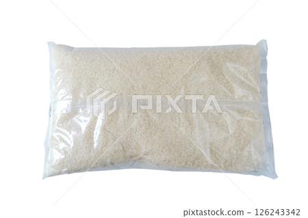 white rice packaged 5 Kg in a plastic bag on white background . white rice packaged 5 Kg in a plastic bag on white background . 126243342