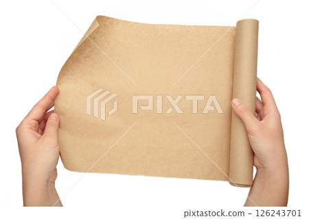 Female hands with roll of baking paper isolated on white background Female hands with roll of baking paper isolated on white background 126243701