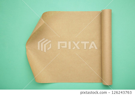 Sheet of baking paper on mint background 126243763