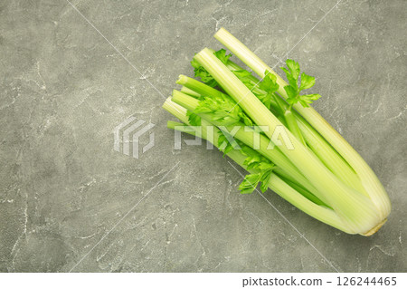 Fresh celery on grey concrete background. 126244465
