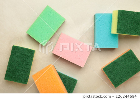 Sponge for dish cleaning on light background Sponge for dish cleaning on light background 126244684