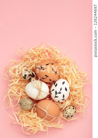 Composition with Easter eggs on pink background Composition with Easter eggs on pink background 126244697