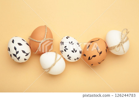 Composition with Easter eggs on beige background. Spring concept 126244783