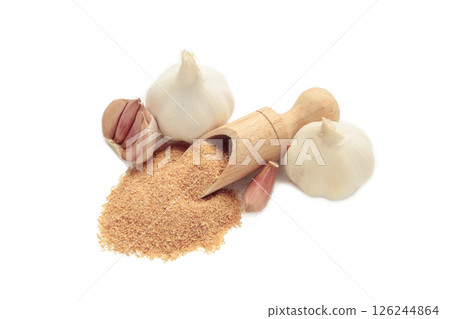 Fresh garlic and garlic powder in bowl isolated on white background. Using spices for meals. Top view Fresh garlic and garlic powder in bowl isolated on white background. Using spices for meals. Top view 126244864