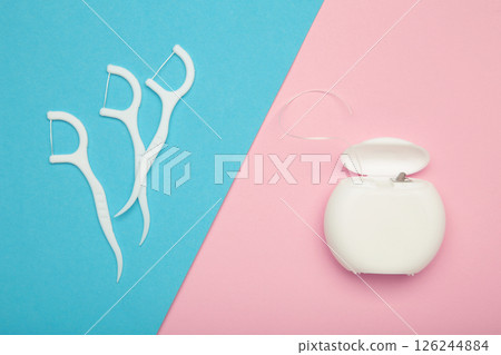 Set of different dental floss on colorful background. Oral dental care products, hygiene cleaning personal use lifestyle concept 126244884