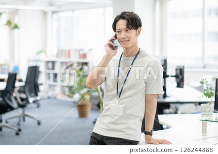Young engineer working in the office Young engineer working in the office 126244888