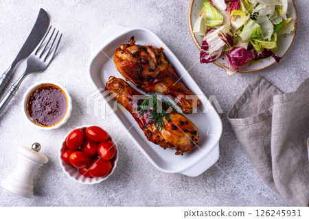 Roasted chicken drumsticks with vegetables Roasted chicken drumsticks with vegetables 126245931