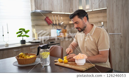 Preparing a refreshing lemon dessert in a cozy kitchen 126246053