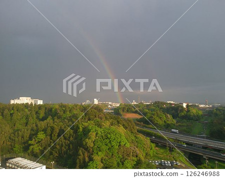 A suburban landscape with a beautiful rainbow A suburban landscape with a beautiful rainbow 126246988