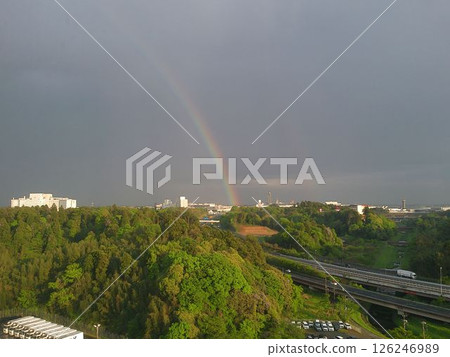 A suburban landscape with a beautiful rainbow A suburban landscape with a beautiful rainbow 126246989