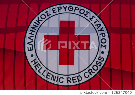 Greece, Thessaloniki, Hellenic Red Cross flag on a fence 126247040