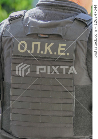 Greece, Thessaloniki, police officer with the word police on his back. 126247044