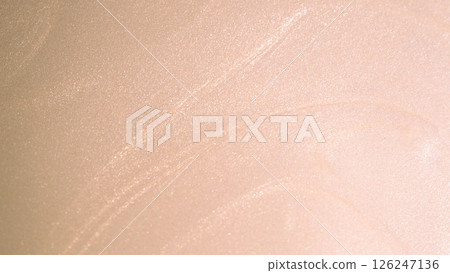 a soft, pearlescent beige or champagne-colored surface, likely photographed under direct light a soft, pearlescent beige or champagne-colored surface, likely photographed under direct light 126247136