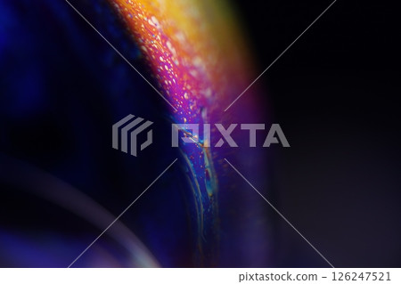 Deep purple liquid surface on black background, oil stains movement, bright chemistry, deep space background Deep purple liquid surface on black background, oil stains movement, bright chemistry, deep space background 126247521