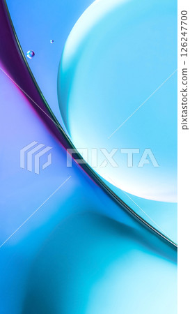 An abstract macro shot featuring soft gradients of blue, cyan, and violet with curved reflections floating droplets. Perfect for backgrounds or modern design inspiration. An abstract macro shot featuring soft gradients of blue, cyan, and violet with curved reflections floating droplets. Perfect for backgrounds or modern design inspiration. 126247700