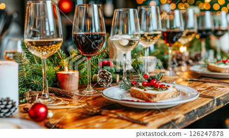 table is elegantly set for celebrating Christmas or New Year. table is elegantly set for celebrating Christmas or New Year. 126247878