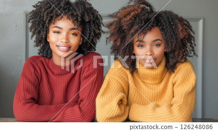 overjoyed multiethnic lesbian couple hugging and looking at each 126248086
