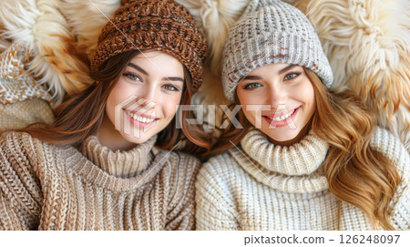 overjoyed multiethnic lesbian couple hugging and looking at each 126248097