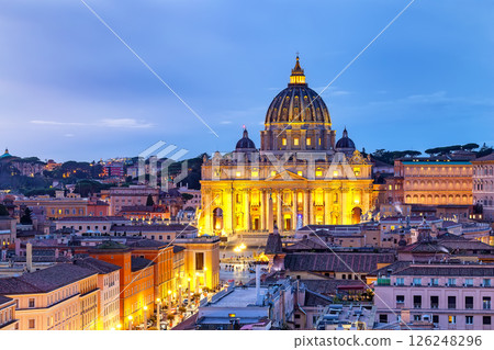 View of St. Peter's Basilica in the Vatican city in sunset, Rome, Italy. Saint Peter Basilica in Vatican City at Rome, Italy and Street Via della Conciliazione. View of St. Peter's Basilica in the Vatican city in sunset, Rome, Italy. Saint Peter Basilica in Vatican City at Rome, Italy and Street Via della Conciliazione. 126248296