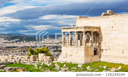 The Porch of the Caryatids on Erechtheion, Acropolis of Athens, Greece. The ancient Erechtheion temple with the beautiful Caryatid pillars in Athens, Greece. 126248344