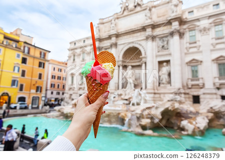 Italian ice cream gelato in front of amazing Trevi Fountain in Rome, Italy. 126248379