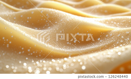 Macro shot of smooth, golden cheese with delicate salt crystals on its surface, highlighting its creamy texture and gentle curves under soft lighting. 126248440