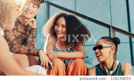 Talking, fashion and women in city on steps in cool clothes, casual outfit or modern style. Relax, discussion or trendy friends with smile in urban town for holiday, streetwear or vacation together 126248635