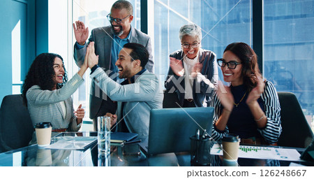 Applause, high five and success with business people in boardroom of office together for celebration. Bonus, milestone and victory with employee group in workplace for goals, motivation or target 126248667
