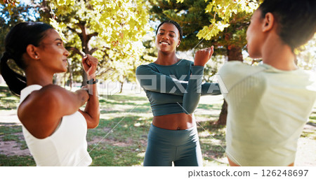 Park, fitness and group of women stretching outdoor with friendship, talking or wellness exercise. Happy, sports and female athletes with arm warm up for health activity with conversation in nature Park, fitness and group of women stretching outdoor with friendship, talking or wellness exercise. Happy, sports and female athletes with arm warm up for health activity with conversation in nature 126248697