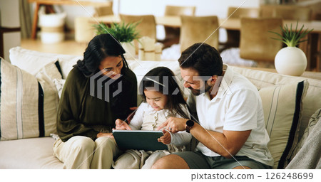 Home, parents and girl with tablet, help and bonding together with happiness, love and digital app for game. Mother, father or daughter in lounge, tech or online safety with entertainment and cartoon 126248699