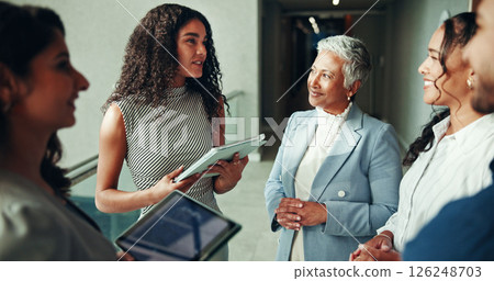Talking, project or business people on tablet in lobby for research, teamwork or accounting proposal. Financial advisor, finance analysts or schedule agenda for budget report, funding or feedback Talking, project or business people on tablet in lobby for research, teamwork or accounting proposal. Financial advisor, finance analysts or schedule agenda for budget report, funding or feedback 126248703